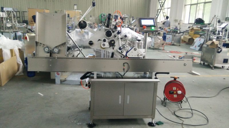 चीन उच्च गति साना गोल डिब्बा लेबल चिपकने मेसिन, नेत्र कालो बोतल लेबल स्टीकर मेशिन प्रसाधन सामग्री आपूर्तिकर्ता को लागी