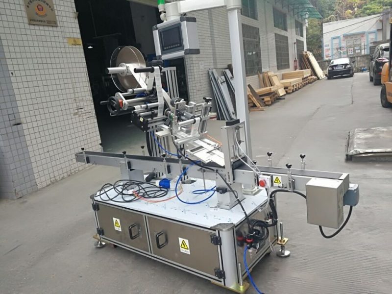 नोजल पाउच इलेक्ट्रिक ड्राइभन प्रकार आपूर्तिकर्ताका लागि चीन स्टिकर शीर्ष लेबलिंग मेशीन